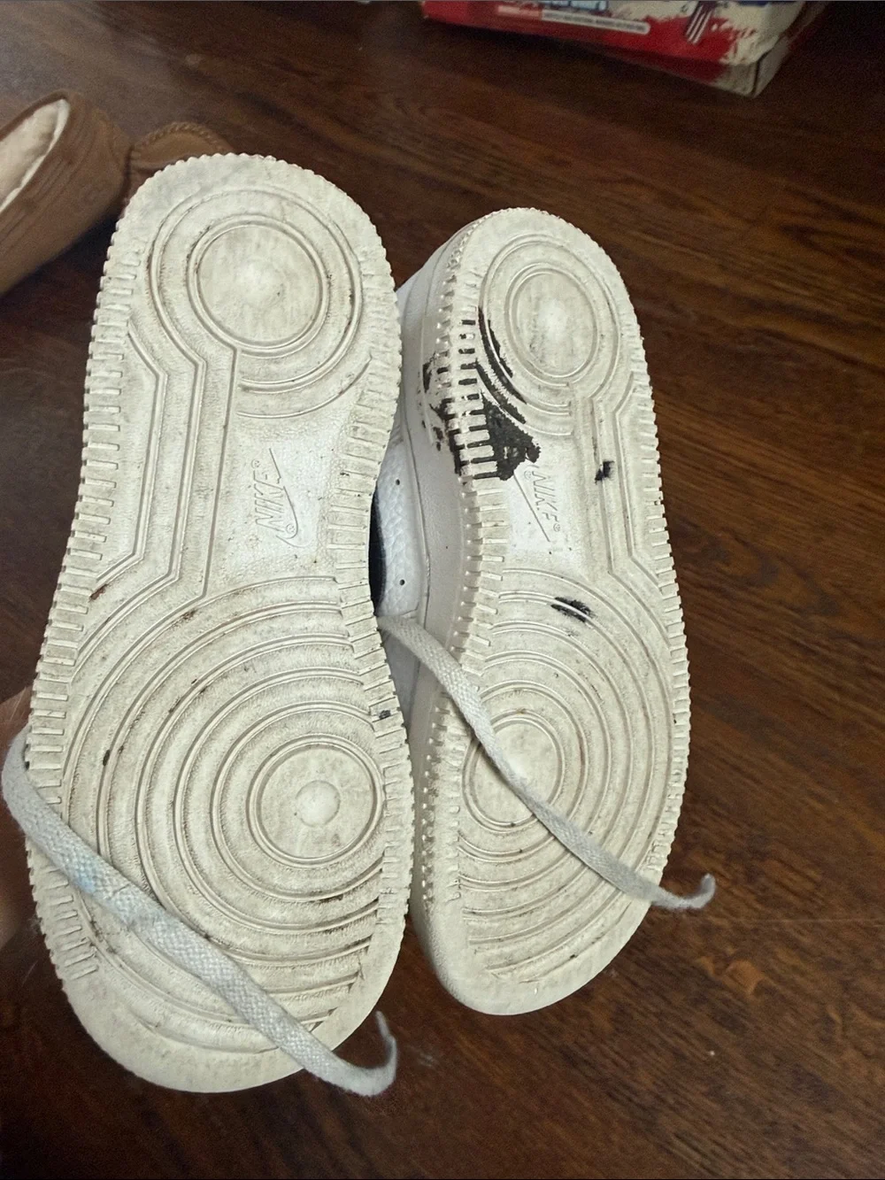 Nike White Sneakers with Black Swoosh